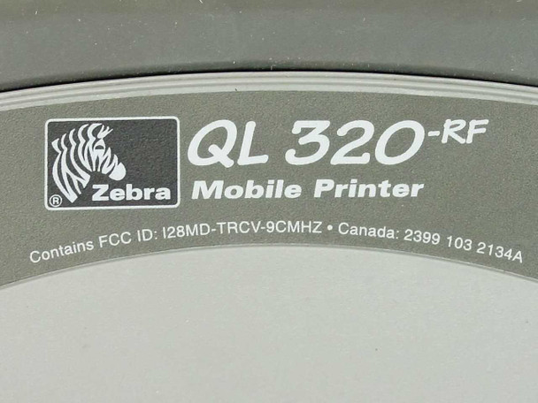 Zebra QL320-RF mobile printer branding label with FCC ID and Canada certification markings