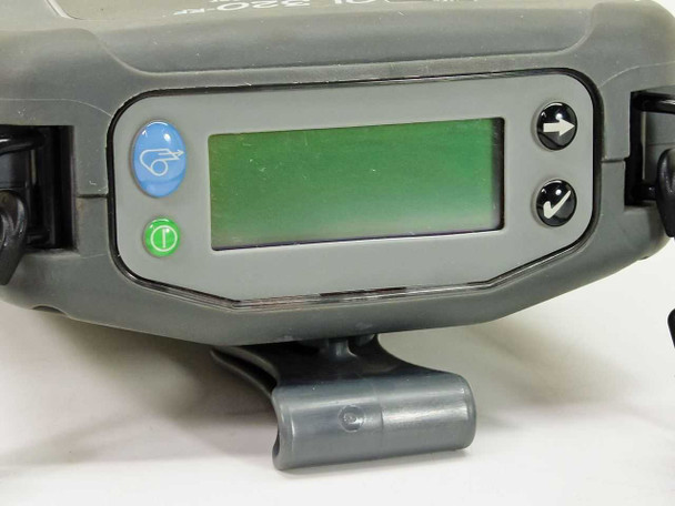 Zebra QL320-RF printer front panel LCD display and control buttons close-up view