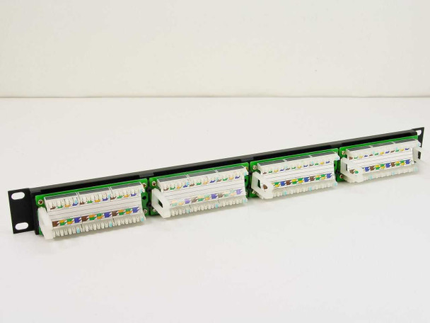 Dynacom CAT 5e 24-Port Patch Panel rear view showing four groups of 110 IDC punch-down blocks with color-coded wiring guides