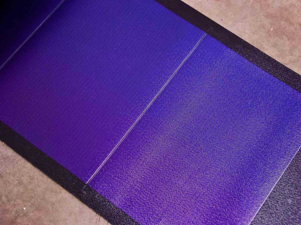 Uni-Solar PVL-144 amorphous solar cell surface closeup showing deep purple thin-film cells and black border framing