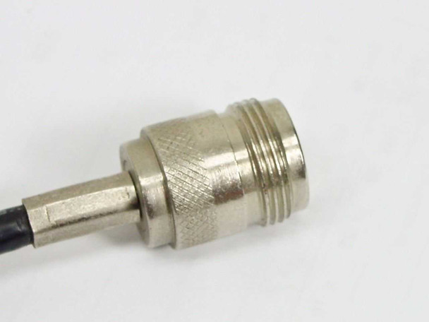 Close-up of nickel-plated N female connector body showing knurled grip and threaded barrel