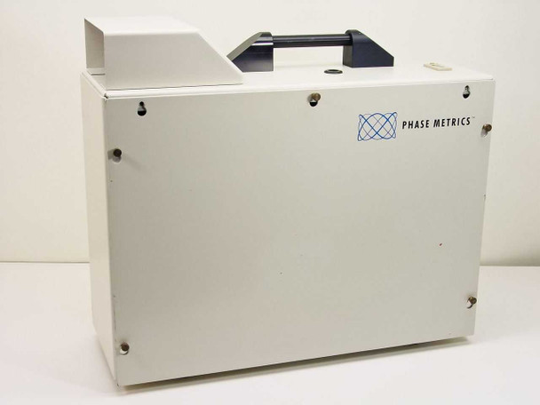 Phase Metrics Lamphouse 038050100B – right side exterior view showing Phase Metrics logo and carry handle