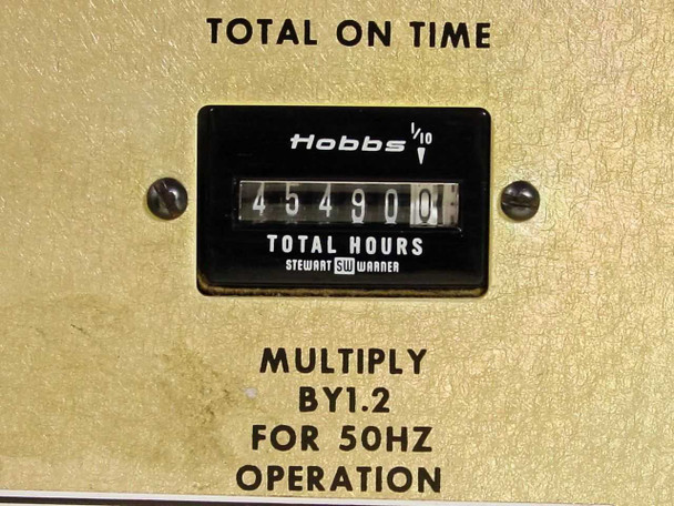 Hobbs total-on-time meter reading 45490.0 hours with note to multiply by 1.2 for 50Hz operation