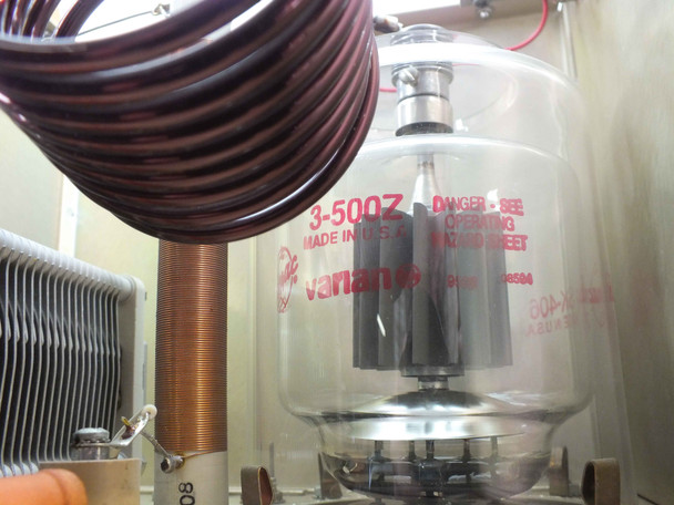 Close-up of Eimac Varian 3-500Z triode vacuum tube inside the RF deck with inductor coil visible