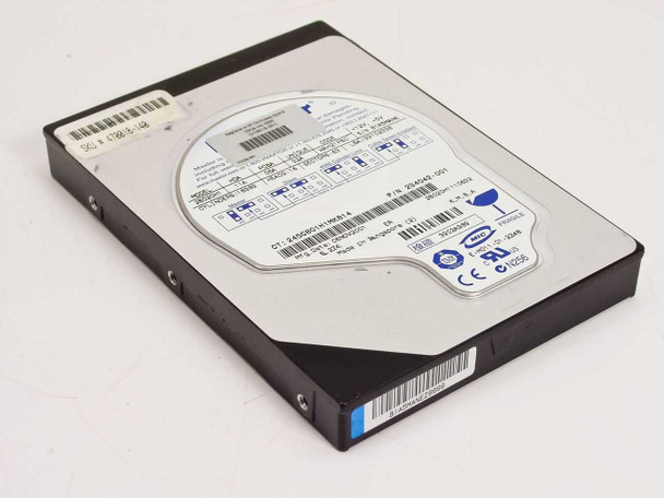 Compaq 218318-001 20GB hard drive — angled top view showing label with part number and barcode