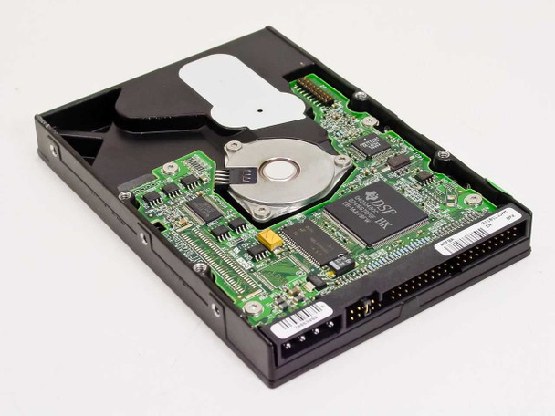 Compaq 218318-001 20GB hard drive — PCB underside view showing DSP controller IC and circuit board components