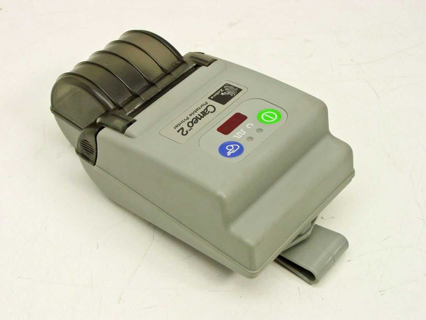 Zebra Cameo 2 Portable Printer – three-quarter rear/right view showing paper compartment lid, belt clip, and blue feed button on opposite side