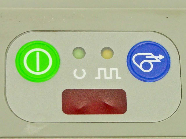 Zebra Cameo 2 front panel close-up showing green power button, two status indicator LEDs (battery and media), red paper-out indicator window, and blue paper feed button