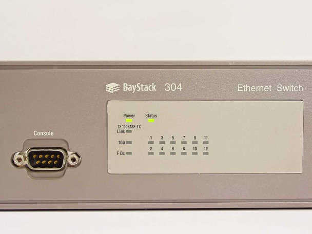 Bay Networks BayStack 304 front panel close-up showing Power and Status LED indicators, port numbering, 100 and FDx indicators, and DB-9 console port