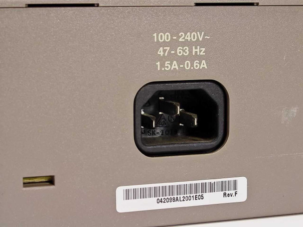 Bay Networks BayStack 304 rear power label close-up showing 100-240V 47-63Hz 1.5A-0.6A rating, IEC inlet, barcode label AL2001E05, and Rev. F hardware revision