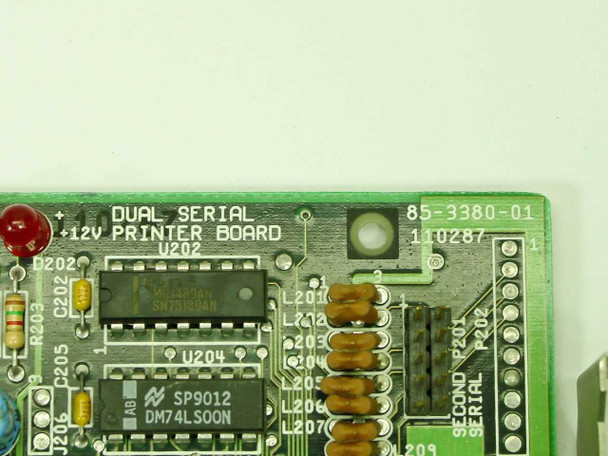 Close-up of Packard Bell ISA card silkscreen reading Dual Serial +12V Printer Board with sub-board number 85-3380-01 and SP9012 / DM74LS00N ICs