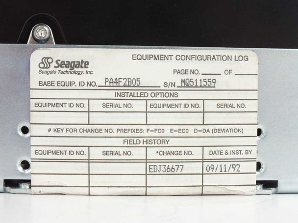 Seagate PA4F2B05 Equipment Configuration Log label showing base equipment ID PA4F2B05, serial number MQ511559, and field history date 09/11/92