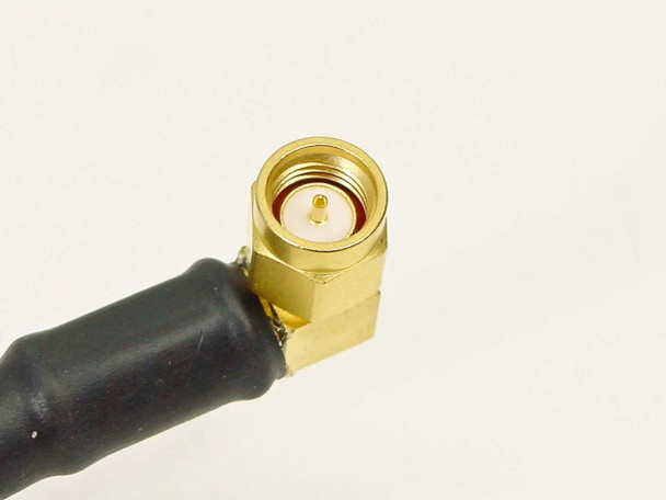 Rosenberger 994131c – close-up of right-angle SMA male connector showing gold-plated body and center pin