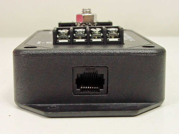 AC Data Systems TJ1010B – end view showing RJ-48C port recessed in enclosure base