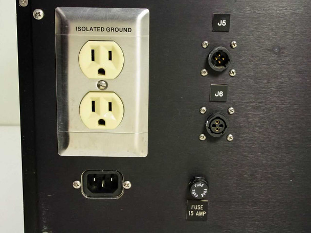 Rear panel detail showing isolated ground duplex outlet, IEC inlet, J5 and J6 XLR connectors, and 15A fuse holder