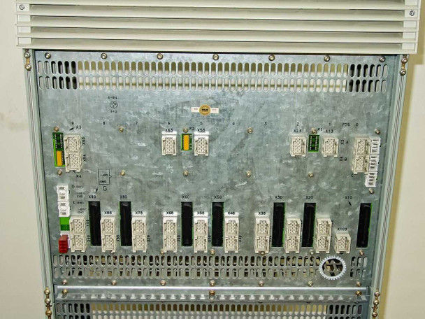 Rolm 9200 PBX chassis – rear panel close-up of top shelf showing multi-pin backplane connectors and labeled terminal blocks