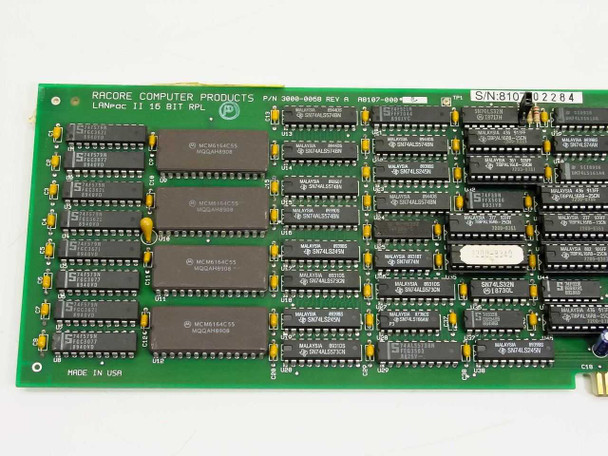 Racore A8107-000 LANpac II PCB close-up showing four Motorola MCM6164C55 SRAM chips, SN74ALS574BN and SN74ALS245N logic ICs, and MADE IN USA marking