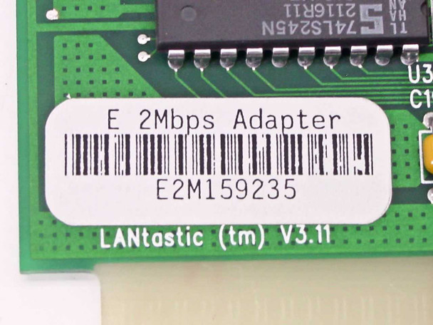 Close-up of Artisoft E2M159235 board label reading E 2Mbps Adapter, part number E2M159235, LANtastic V3.11