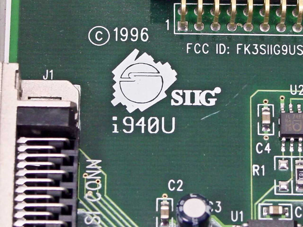 SIIG i940U close-up — board silkscreen showing SIIG logo, i940U model designation, copyright 1996, and FCC ID FK3SIIG9US