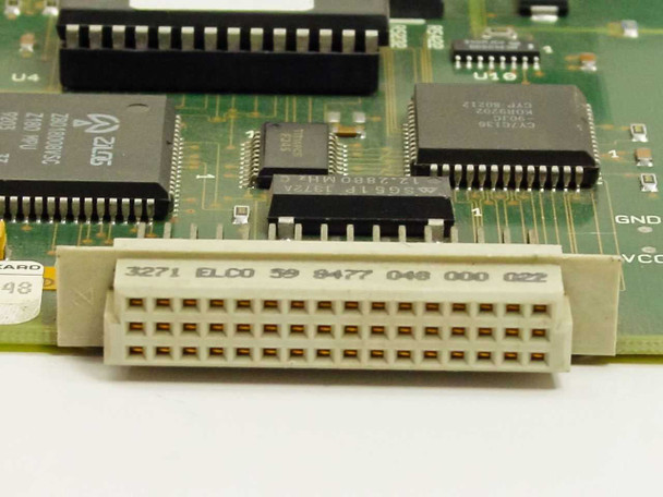 Close-up of ELCO 59-pin backplane edge connector on HP A-3210-48 module with ALUS logic ICs visible