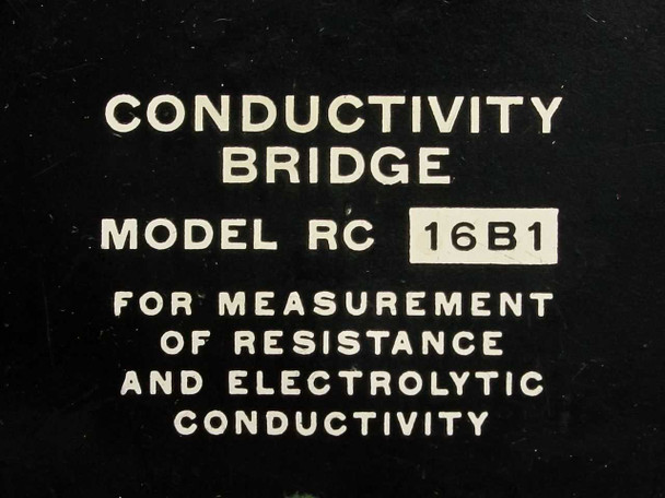 Industrial Instruments RC 16B1 Conductivity Bridge front panel label close-up reading Conductivity Bridge Model RC 16B1 For Measurement of Resistance and Electrolytic Conductivity