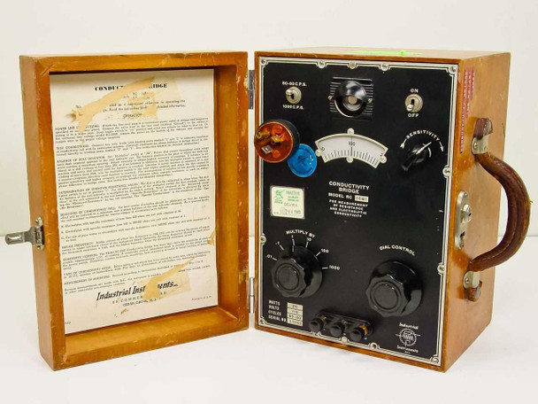 Industrial Instruments RC 16B1 Conductivity Bridge open in wood carry case showing front panel with meter, controls, and instruction sheet inside lid