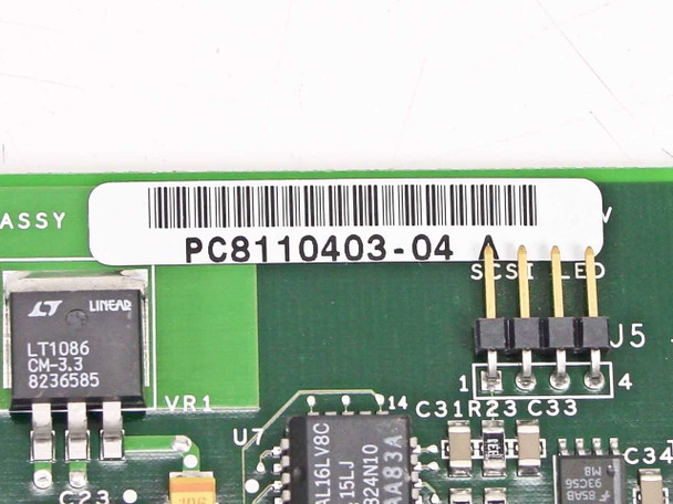 Close-up of QLogic QLA1080 assembly label showing part number PC8110403-04, SCSI LED header, and Linear Technology LT1086 CM-3.3 voltage regulator chip