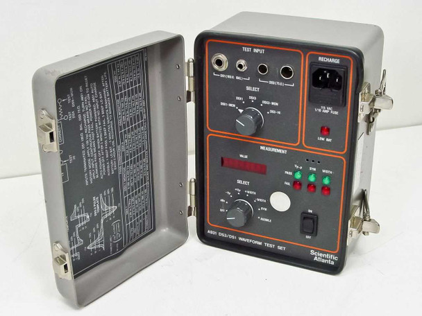 Scientific Atlanta A931 DS3/DS1 Waveform Test Set open in travel case showing front panel controls, LED display, and SELECT knob