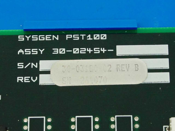Sysgen PST100 label close-up showing ASSY 30-02454, Rev B sticker, and S/N field on green PCB