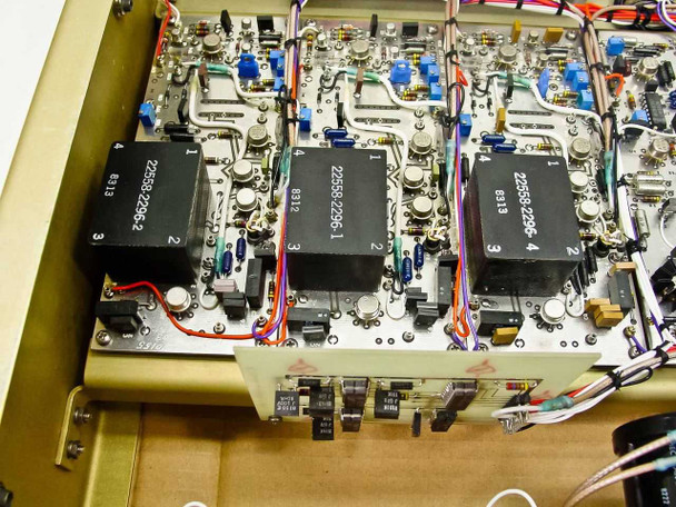 Hughes FM Data Detector interior PCB detail – three transformer modules marked 22558-2296 (variants -1, -2, -4) arranged across the main circuit board