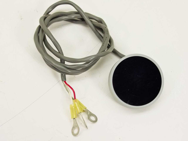 Hitachi RS-1000D Sensor Head reverse side showing black sensing face and attached gray cable with yellow ring terminals