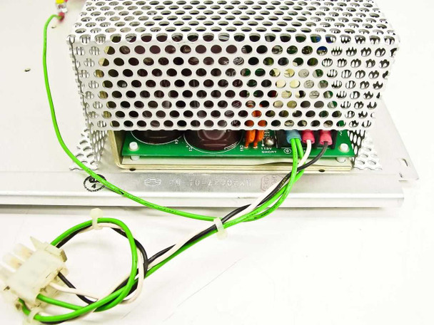 VMX SA10096-01 power supply close-up of base mounting plate showing stamped part number SM20037-01 B2 with green and white wiring