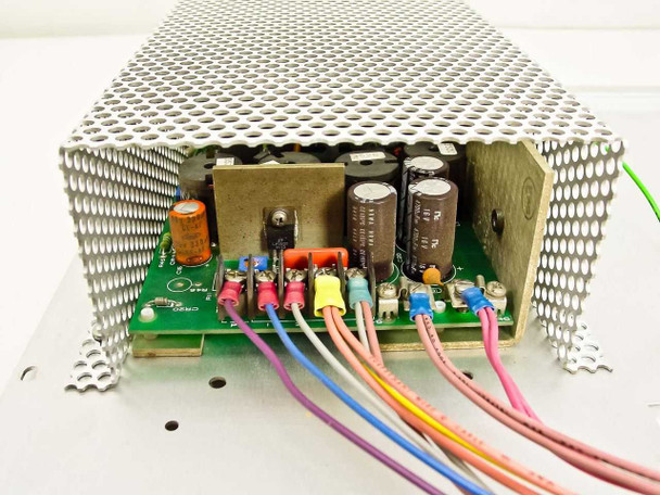 VMX DIAL SA10096-01 internal PCB view – electrolytic capacitors, transformers, and multi-pin connector terminal block visible