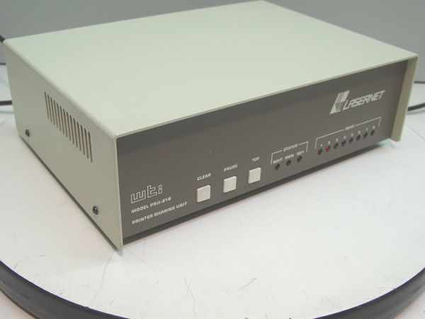 WTI Lasernet PSU-81B Printer Sharing Unit — front-left three-quarter view showing top vent, front panel controls, and Lasernet logo