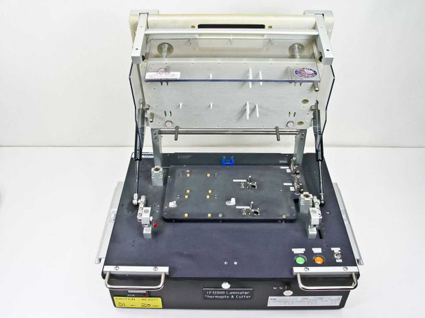 Circuit Check TF12000 with laminator arm raised — open view showing internal platen, circuit board, and base unit controls