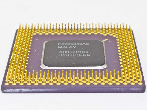 Intel Pentium SY062 A80502120 – angled underside view showing gold pin array and processor die label detail