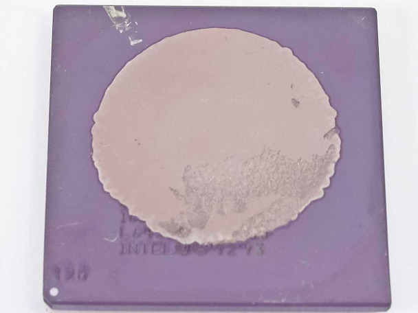 Intel SL22M Pentium 120MHz Socket 7 CPU — bottom (contact/lid) side showing purple ceramic substrate and partial label