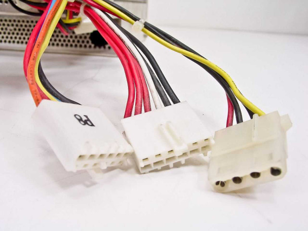 Seasonic SS-220 output connectors close-up – AT P8/P9 motherboard connectors and Molex 4-pin peripheral connectors