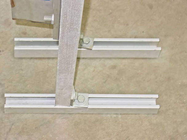 Base of Nortec 1502089 USD freestanding support frame showing aluminum extrusion feet and mounting hardware