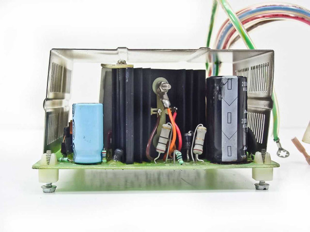 Radius 915-0028 Mac power supply – side profile view showing heat sink assembly, large filter capacitors, and power components