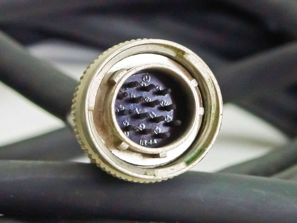 Single JAE circular connector face close-up showing 14-position socket pin arrangement
