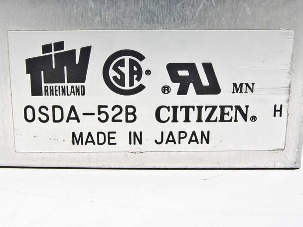 Citizen OSDA-52B label closeup showing model number, Citizen brand, Made in Japan, TÜV Rheinland, CSA, and UL certifications