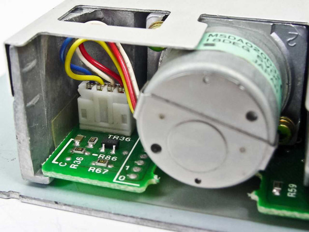 Citizen OSDA-52B internal view showing stepper motor, wiring harness, and small PCB with components TR36, R86, R67