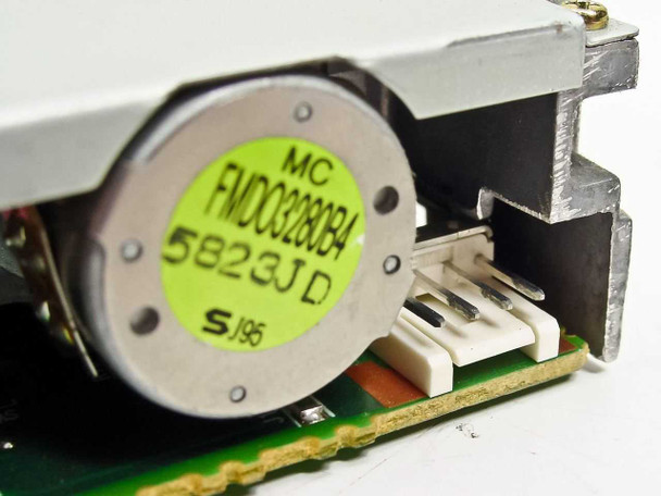 Panasonic JU-257A656P — closeup of spindle motor with MC FMD03280B4 date code label