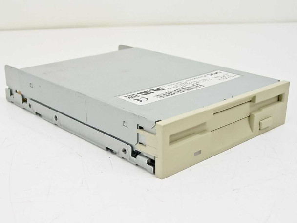 NEC FD1231H 3.5-inch 1.44MB internal floppy disk drive — front-right angled view showing beige faceplate and drive bay
