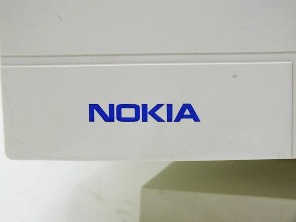 Nokia Consumer Electronics logo close-up on beige monitor housing, blue lettering