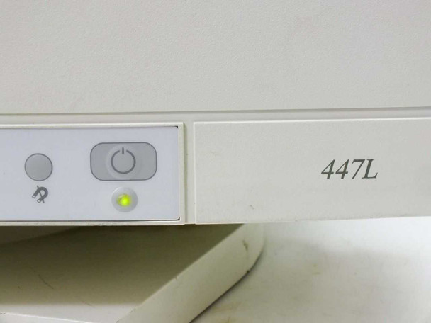 Nokia 447L model number label on lower bezel with power button, indicator LED illuminated green, and degauss button