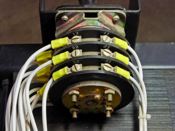 Quality Transformer Electronics 4690 — close-up of multi-layer rotary tap switch assembly showing wire connections at tap positions 12, 11, 22, 21, 32, 31 and circular common bus at base