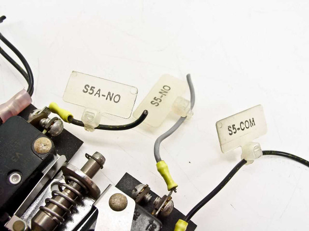 Micro Switch 9125 wire lead labels close-up — three labeled leads: S5A-NO (normally open), S5-NO (normally open), and S5-COM (common)