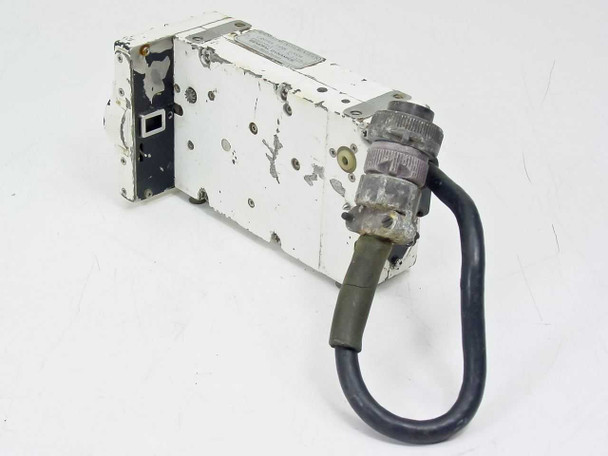 Traid Corp 1000-B 16mm Camera – rear/side view showing heavily worn white painted housing and MIL-spec circular connector with cable